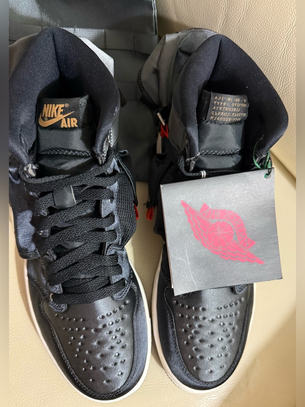 Jordan Black Leather & Textile High-Top Sneakers with Red Hang Tag